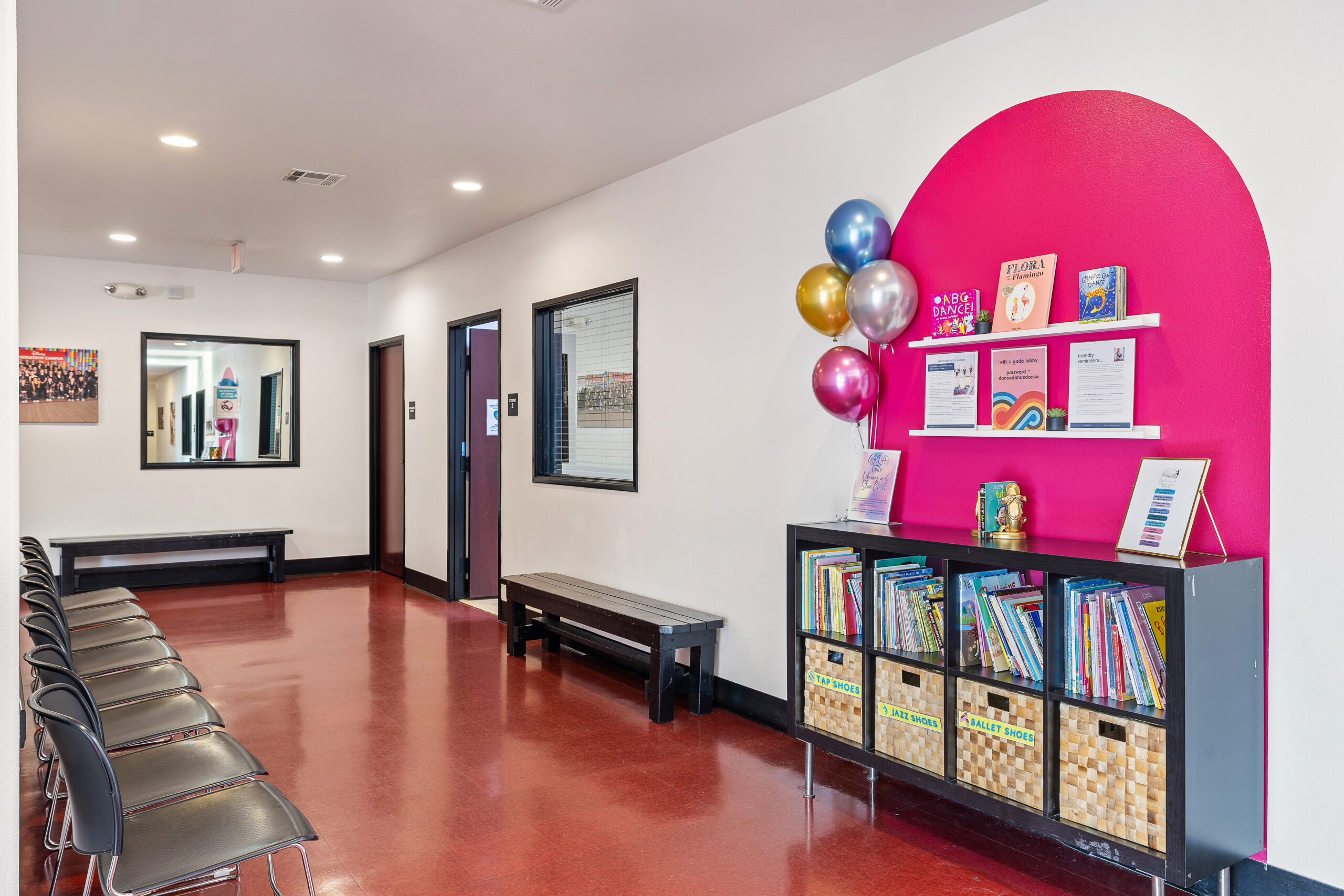 Waiting area with books for siblings
